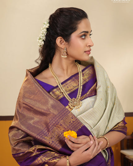 Pista Green-Purple Pure Kanchipuram Silk Saree with Allover zari checks & buttas and Rettapet zari woven border