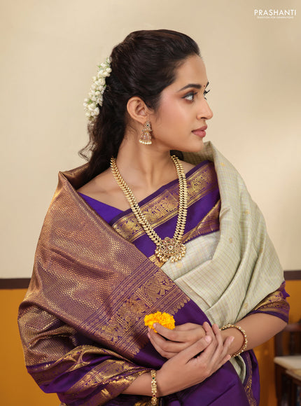 Beige-Purple Pure Kanchipuram Silk Saree with Allover zari checks & buttas and Rettapet zari woven border