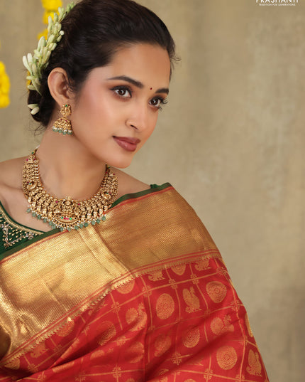 Red Pure kanchipuram silk saree with allover zari checks & annam buttas and zari woven border