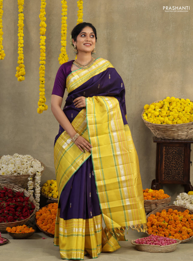 Blue-Yellow Pure Kanchipuram silk saree with zari woven buttas & long zari woven border