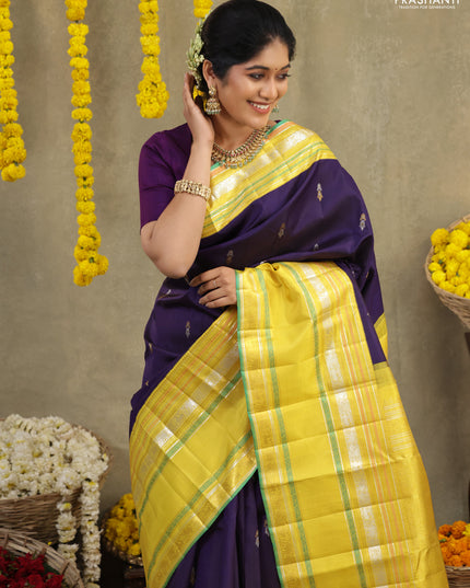 Blue-Yellow Pure Kanchipuram silk saree with zari woven buttas & long zari woven border