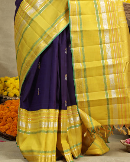 Blue-Yellow Pure Kanchipuram silk saree with zari woven buttas & long zari woven border