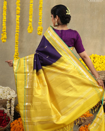 Blue-Yellow Pure Kanchipuram silk saree with zari woven buttas & long zari woven border
