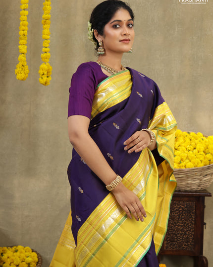 Blue-Yellow Pure Kanchipuram silk saree with zari woven buttas & long zari woven border