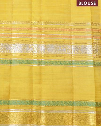 Blue-Yellow Pure Kanchipuram silk saree with zari woven buttas & long zari woven border