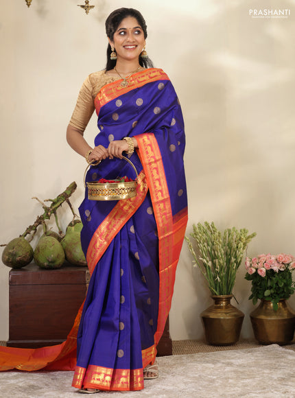Blue-Dual shade of pinkish orange pure kanchipuram silk saree with zari woven buttas & zari woven border
