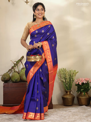 Blue-Dual shade of pinkish orange pure kanchipuram silk saree with zari woven buttas & zari woven border