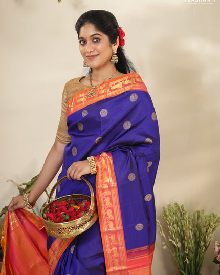 Blue-Dual shade of pinkish orange pure kanchipuram silk saree with zari woven buttas & zari woven border