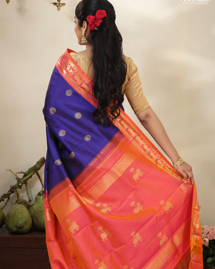 Blue-Dual shade of pinkish orange pure kanchipuram silk saree with zari woven buttas & zari woven border