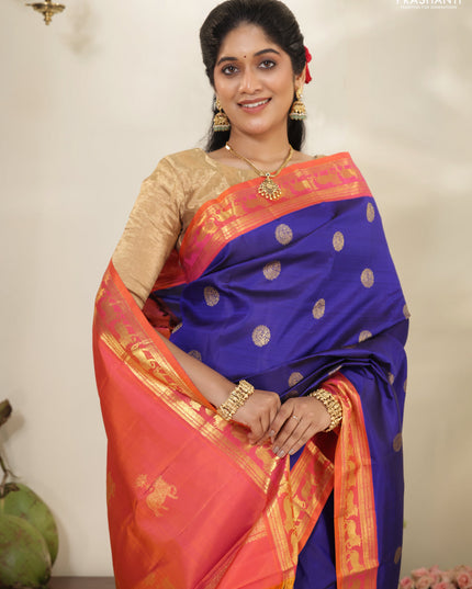 Blue-Dual shade of pinkish orange pure kanchipuram silk saree with zari woven buttas & zari woven border