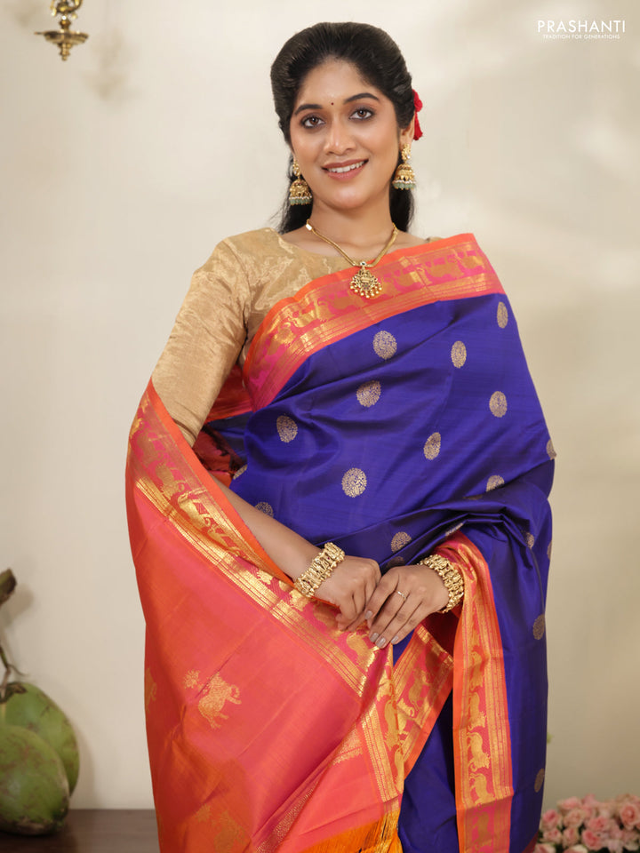 Blue-Dual shade of pinkish orange pure kanchipuram silk saree with zari woven buttas & zari woven border