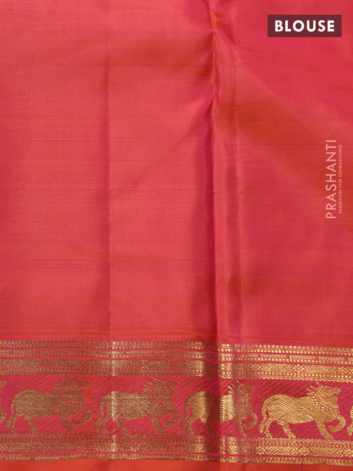 Blue-Dual shade of pinkish orange pure kanchipuram silk saree with zari woven buttas & zari woven border