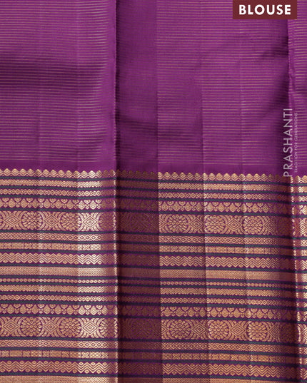 Pastel Green-Purple Pure kanchipuram silk saree with allover zari weaves & buttas and long zari woven border