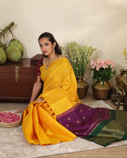 Mustard yellow-Purple pure kanchipuram silk saree with zari woven buttas & in borderless style