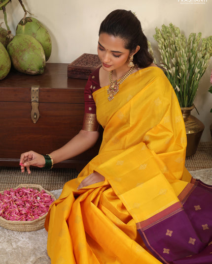 Mustard yellow-Purple pure kanchipuram silk saree with zari woven buttas & in borderless style