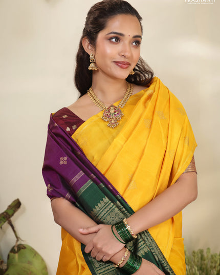 Mustard yellow-Purple pure kanchipuram silk saree with zari woven buttas & in borderless style
