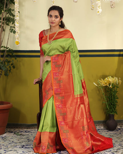 Light Green-Red pure kanchipuram silk saree with allover zari woven brocade weaves & long zari woven border