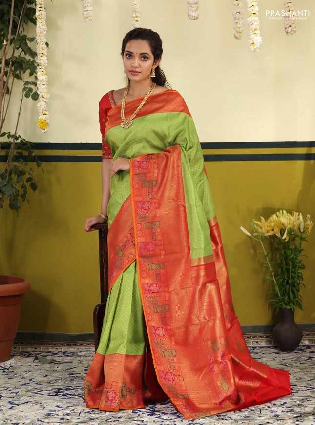 Light Green-Red pure kanchipuram silk saree with allover zari woven brocade weaves & long zari woven border