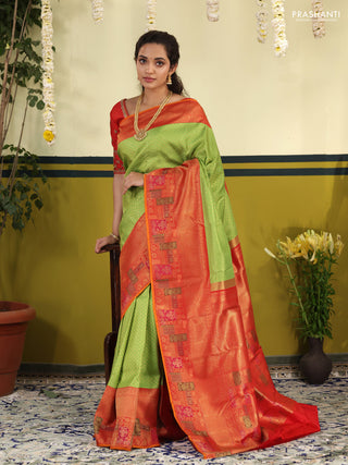 Light Green-Red pure kanchipuram silk saree with allover zari woven brocade weaves & long zari woven border