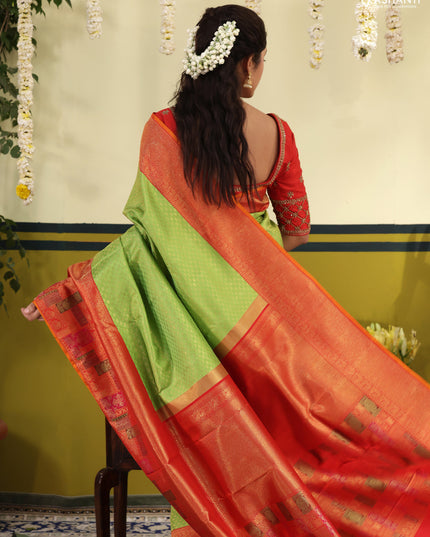 Light Green-Red pure kanchipuram silk saree with allover zari woven brocade weaves & long zari woven border