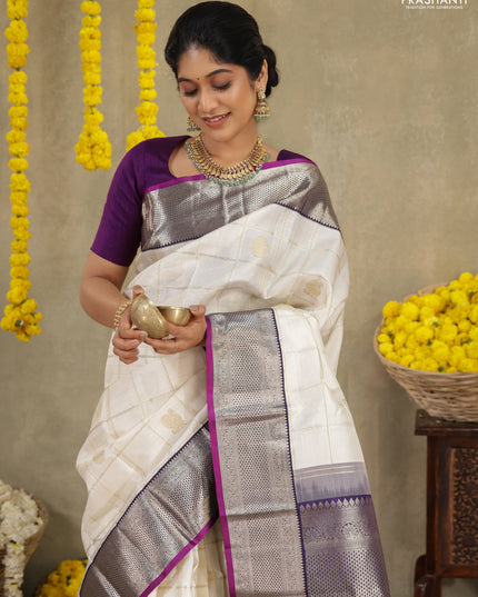 Off white-Purple Pure kanchipuram silk saree with allover zari checks & buttas and zari woven border