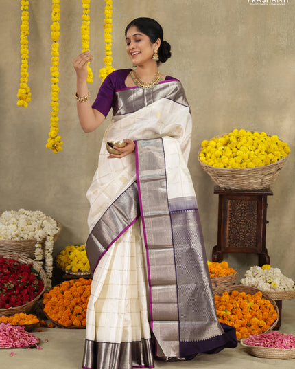 Off white-Purple Pure kanchipuram silk saree with allover zari checks & buttas and zari woven border