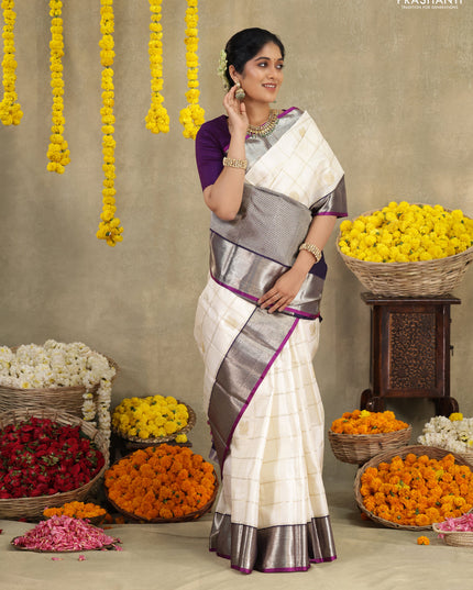 Off white-Purple Pure kanchipuram silk saree with allover zari checks & buttas and zari woven border