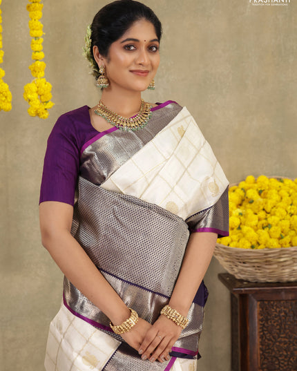 Off white-Purple Pure kanchipuram silk saree with allover zari checks & buttas and zari woven border