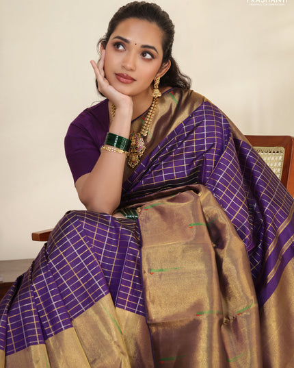 Violet Pure kanchipuram silk saree with allover zari checks & long zari woven muniya butta border