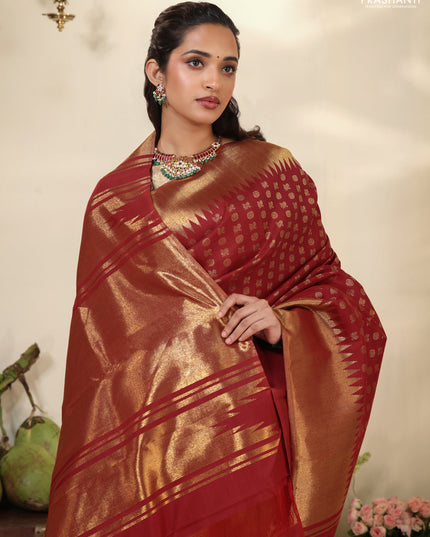 Red Pure Kanchipuram silk saree with allover annam & rudhrasham zari woven buttas & temple zari woven border