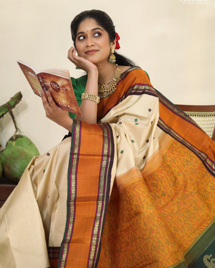 Cream-Deep jamun Pure kanchipuram silk saree with thread woven buttas & zari woven border