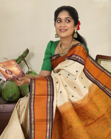 Cream-Deep jamun Pure kanchipuram silk saree with thread woven buttas & zari woven border