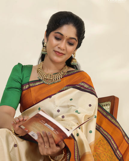 Cream-Deep jamun Pure kanchipuram silk saree with thread woven buttas & zari woven border