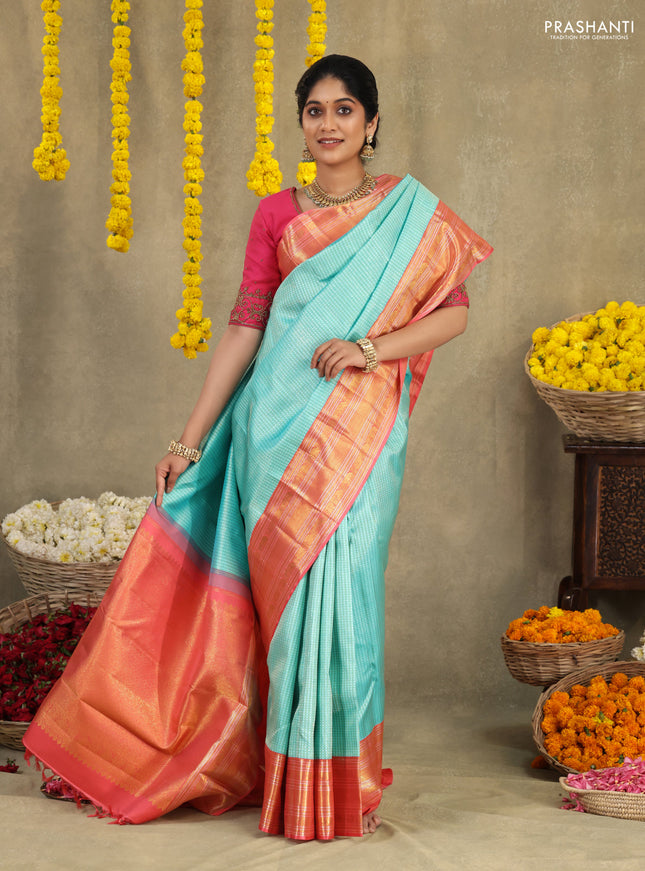 Teal blue-Peach Pink Pure Kanchipuram Silk Saree With Silver & Gold zari weaves & rich zari border