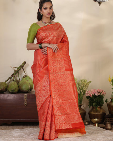 Orange Pure kanchipuram silk saree with allover zari woven brocade weaves & zari woven border