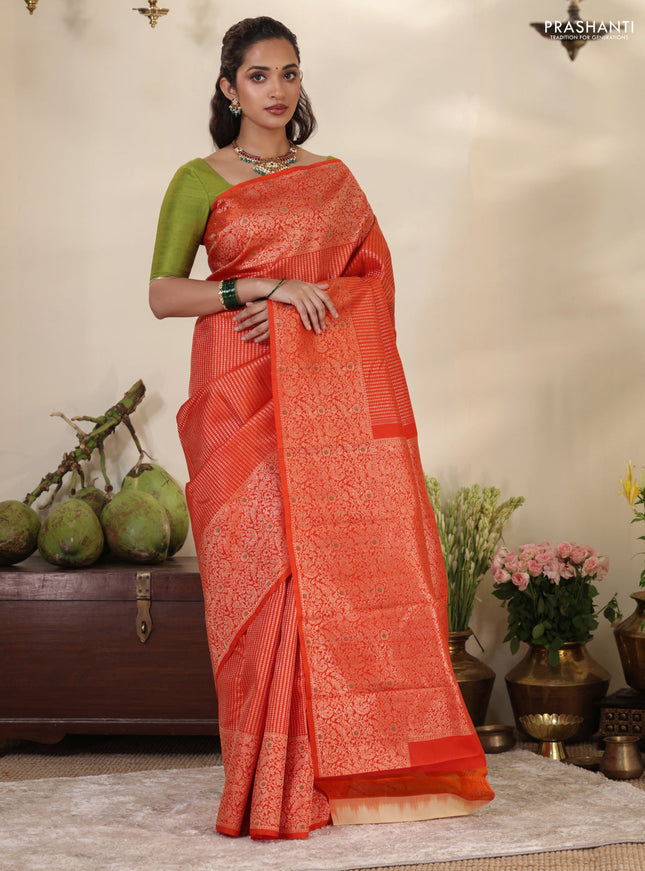 Orange Pure kanchipuram silk saree with allover zari woven brocade weaves & zari woven border