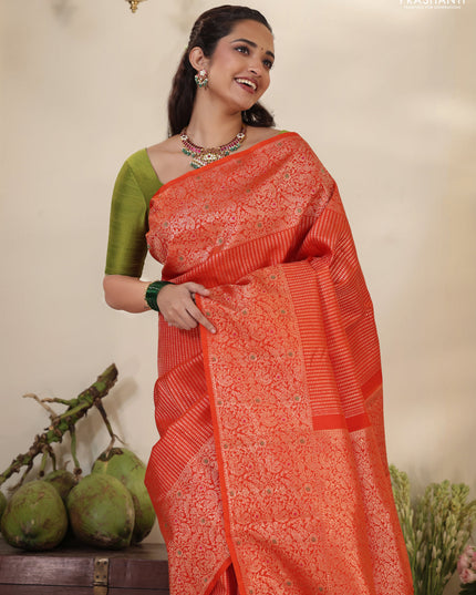 Orange Pure kanchipuram silk saree with allover zari woven brocade weaves & zari woven border