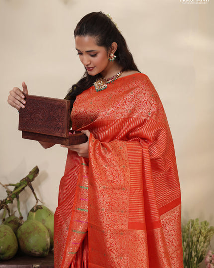 Orange Pure kanchipuram silk saree with allover zari woven brocade weaves & zari woven border
