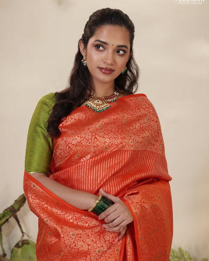 Orange Pure kanchipuram silk saree with allover zari woven brocade weaves & zari woven border