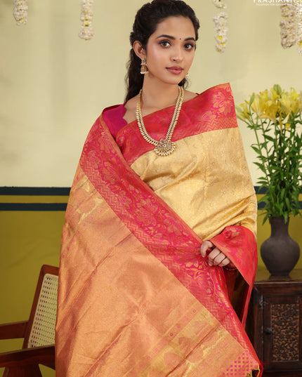 Sandal-Pink Pure kanchipuram silk saree with allover brocade zari weaves & rich zari woven border