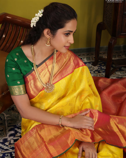 Yellow-pink Pure Kanchipuram Silk Saree With Allover zari weaves & long zari woven border
