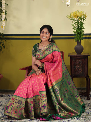 Dual shade of pinkish orange-Green Pure kanchipuram silk saree & long paithani style border