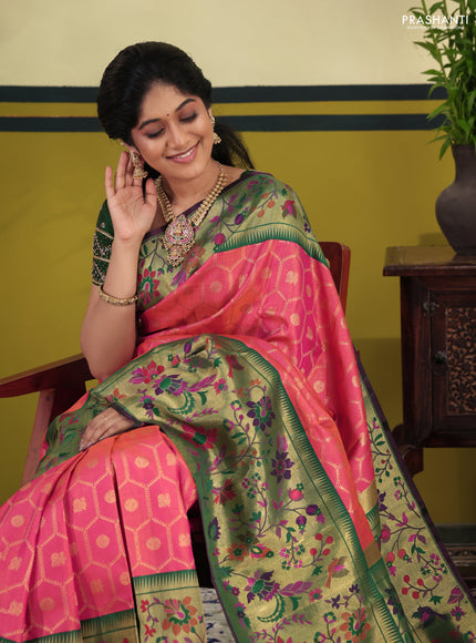 Dual shade of pinkish orange-Green Pure kanchipuram silk saree & long paithani style border