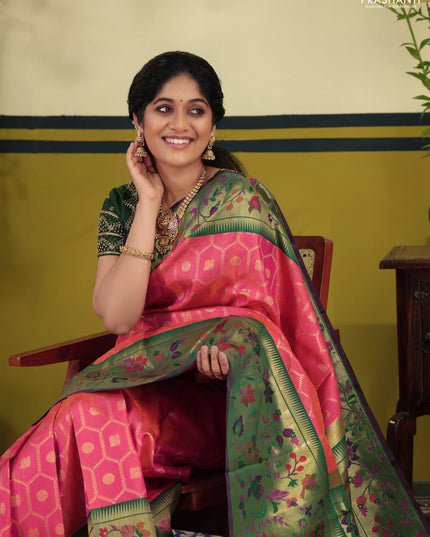 Dual shade of pinkish orange-Green Pure kanchipuram silk saree & long paithani style border