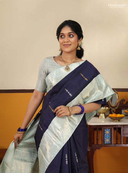 Navy blue-Pastel blue Pure kanchipuram silk saree With zari woven buttas & rich zari border