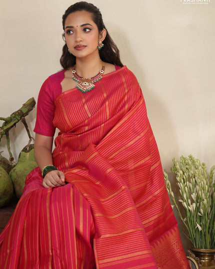 Pink pure kanchipuram silk saree with allover zari stripes pattern & in borderless style