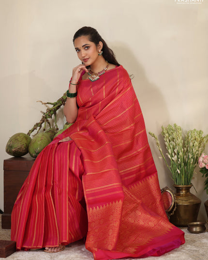 Pink pure kanchipuram silk saree with allover zari stripes pattern & in borderless style