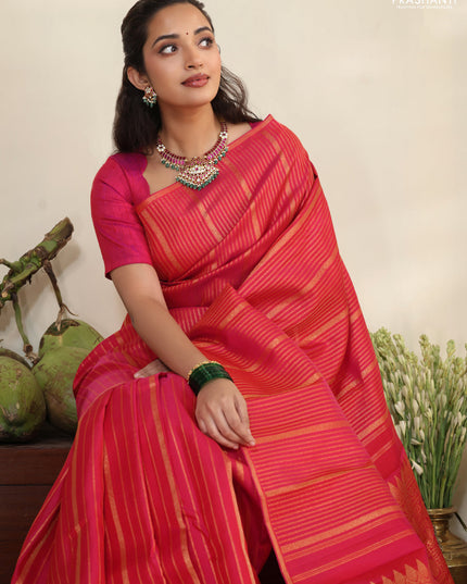 Pink pure kanchipuram silk saree with allover zari stripes pattern & in borderless style