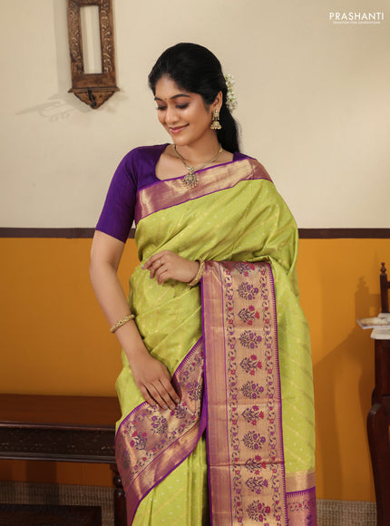 Lime green-Purple Pure kanchipuram silk saree with allover zari weaves with rich paithani style border