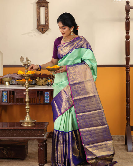 Teal-Blue Pure kanchipuram silk saree with Allover zari weaves and long rich zari border